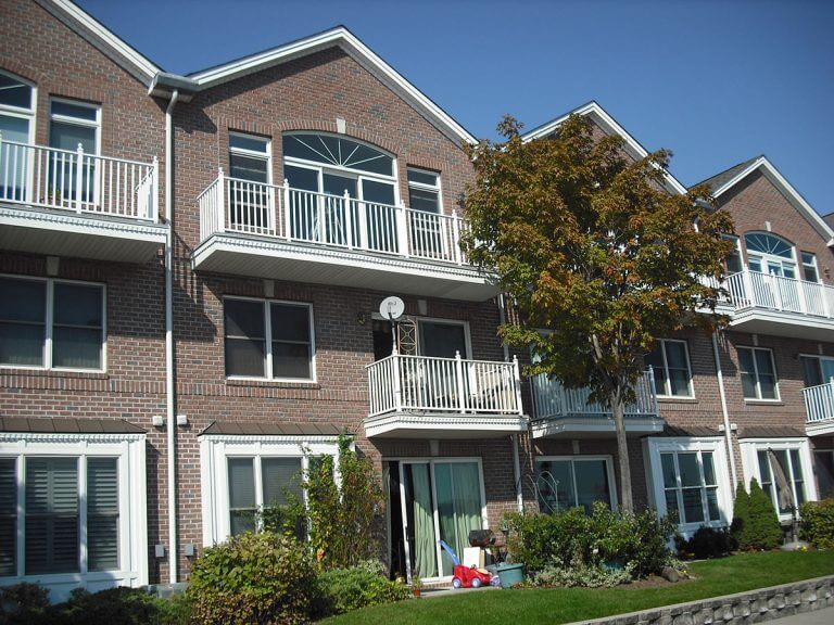 Townhouse inspected by Checkmark Plus: brick with balconies