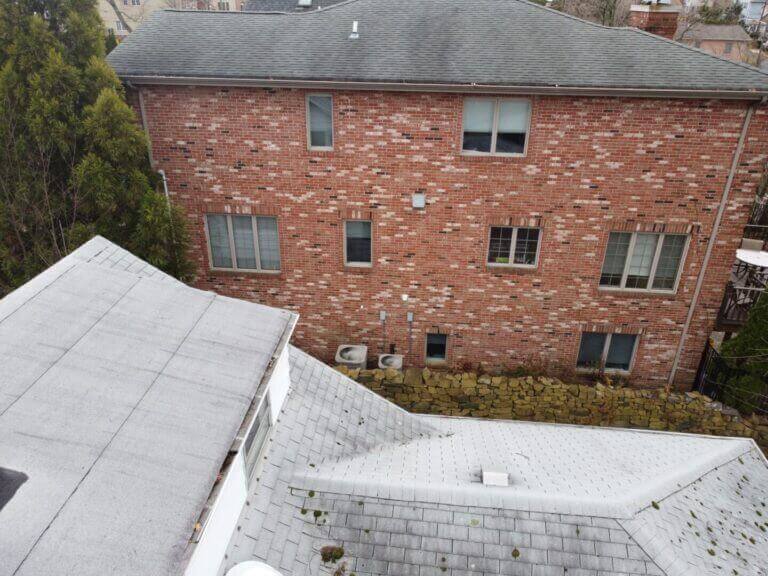 Aerial view of a brick house with two roofs, Saddle Brook, NJ, United States