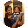 Google reviewer photo, parent holding a child